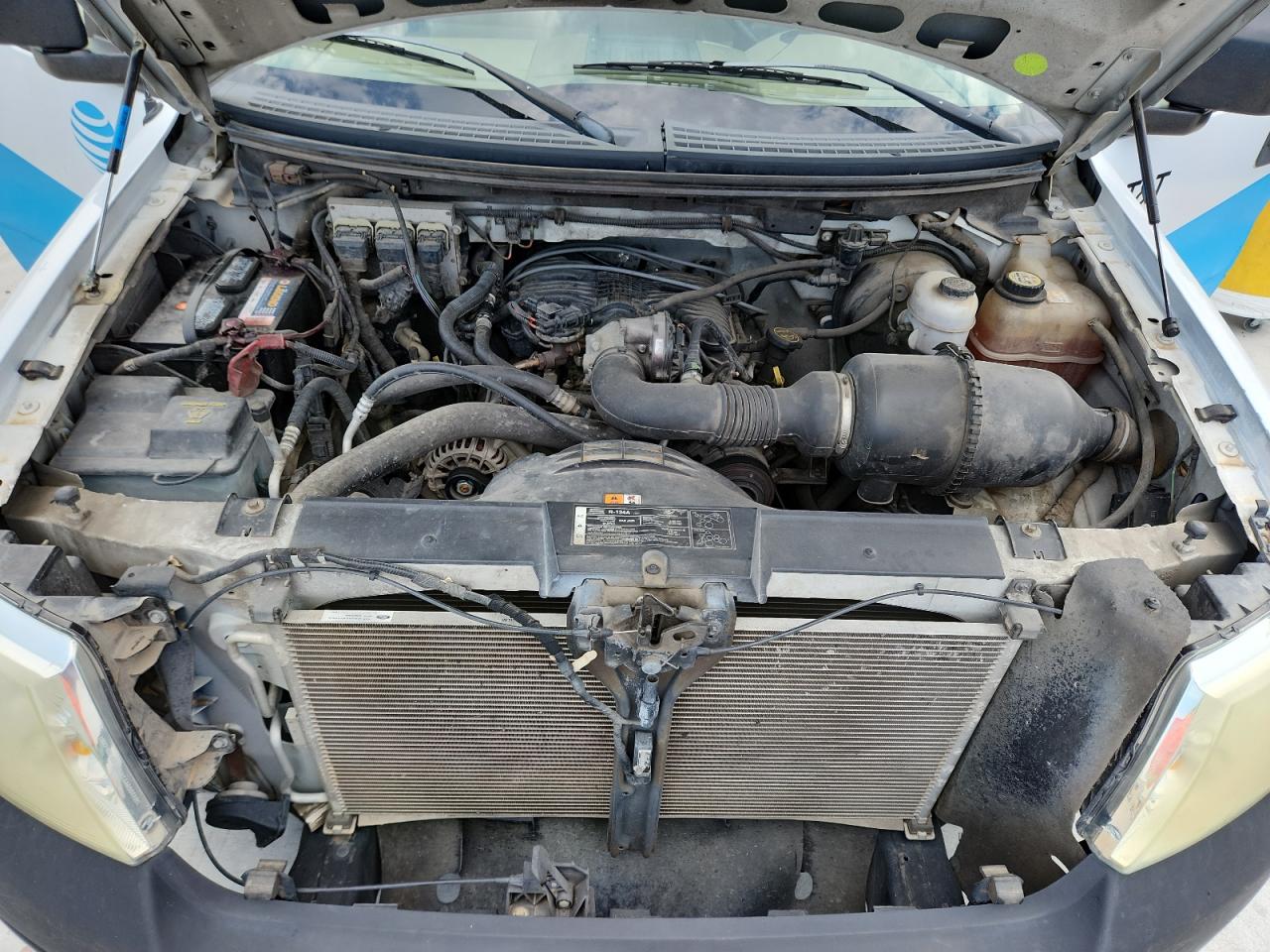 2008 Ford F150 White vin: 1FTRF12238KB70024 Damage: Left Head Lamp, Faded, Repair Required