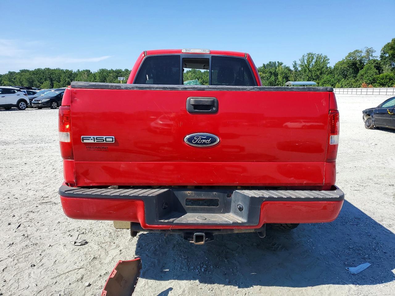 2005 Ford F150 Red vin: 1FTRF12245KE63183
