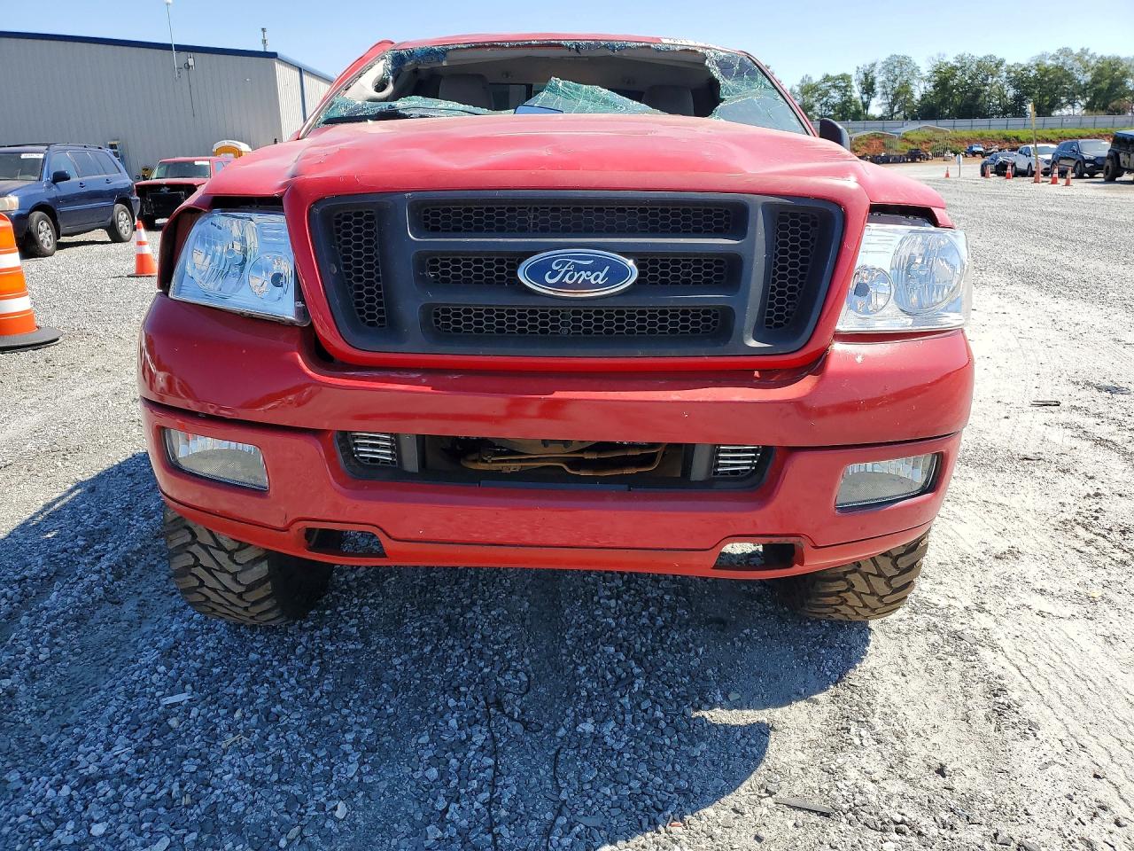 2005 Ford F150 Red vin: 1FTRF12245KE63183