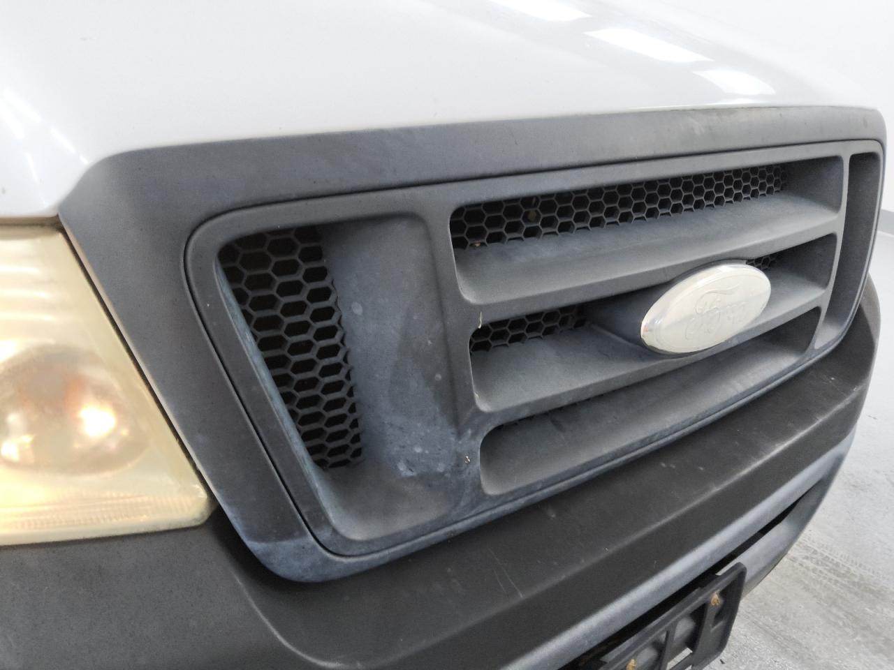 2008 Ford F150 White vin: 1FTRF12248KB70100 Damage: Grille, Heavy Scratch, 1 To 2 Inches