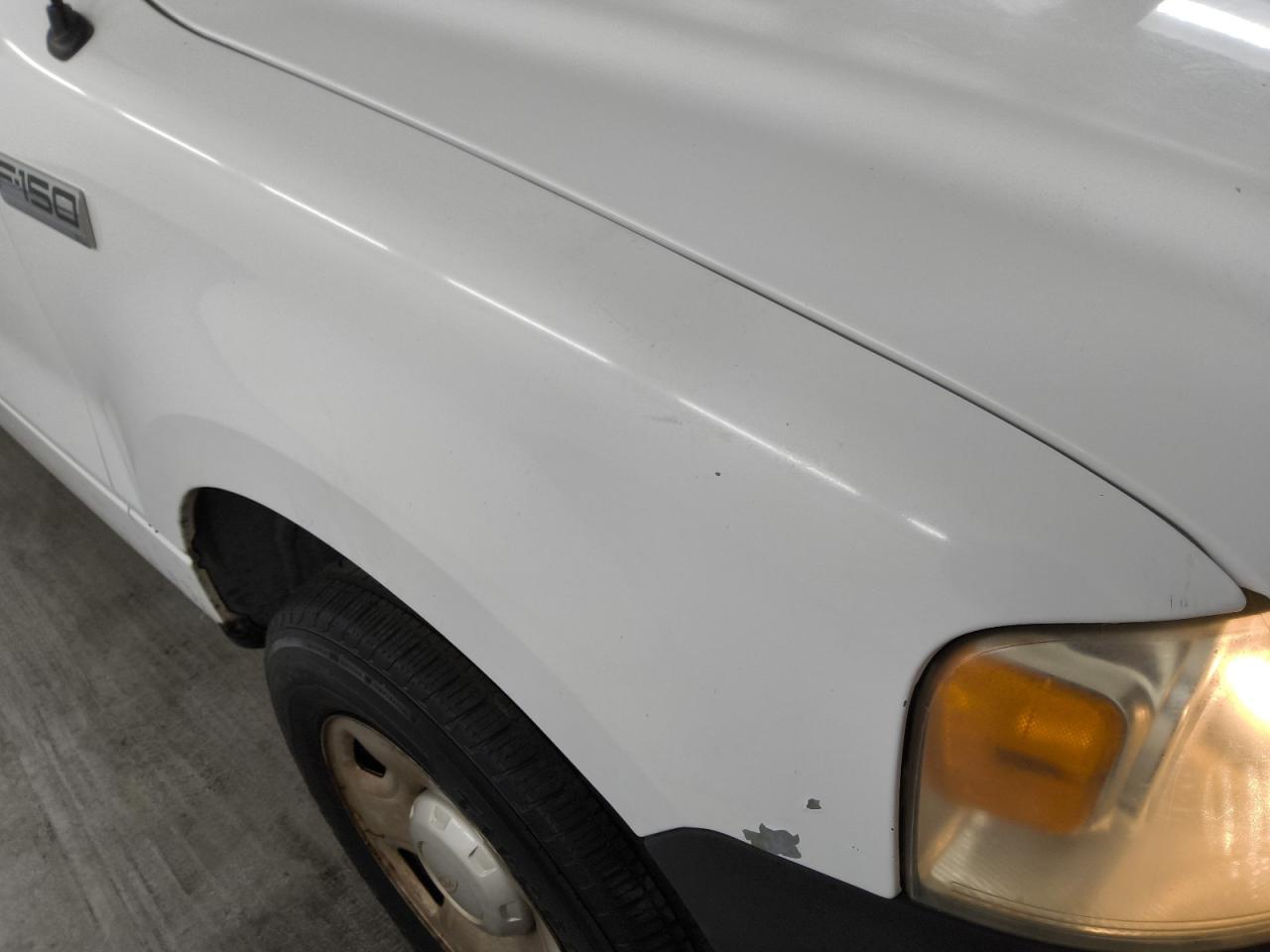 2008 Ford F150 White vin: 1FTRF12248KB70100 Damage: Right Front Fender, Peeling, 1 To 2 Inches