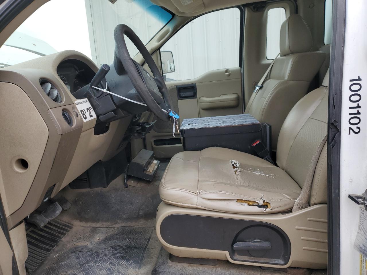 2008 Ford F150 W/knapheide Knap Kap Two Tone vin: 1FTRF12268KB87786 Damage: Left Front Seat, Torn, > 12 Inches