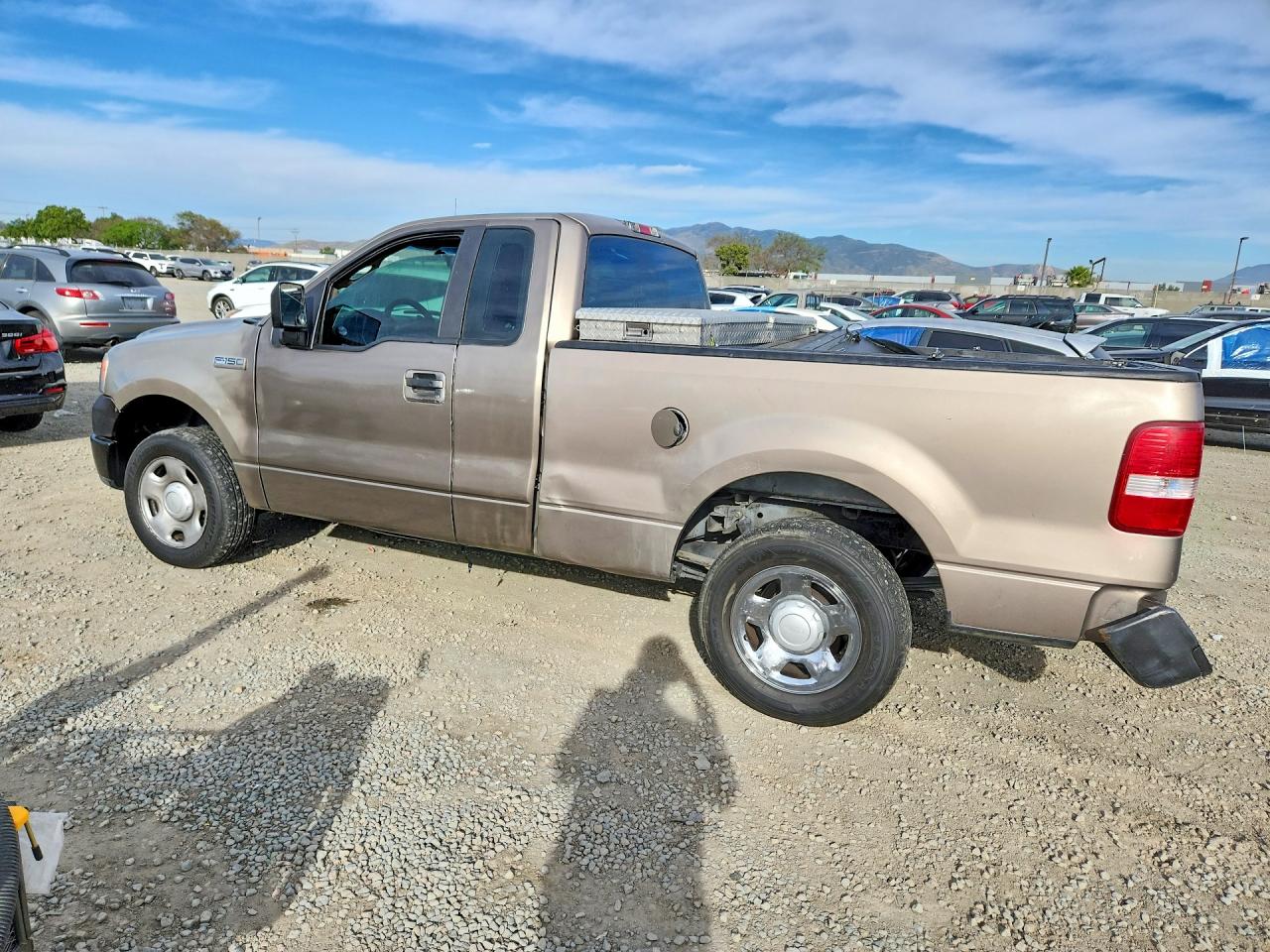 2005 Ford F150 Gold vin: 1FTRF122X5KD69552