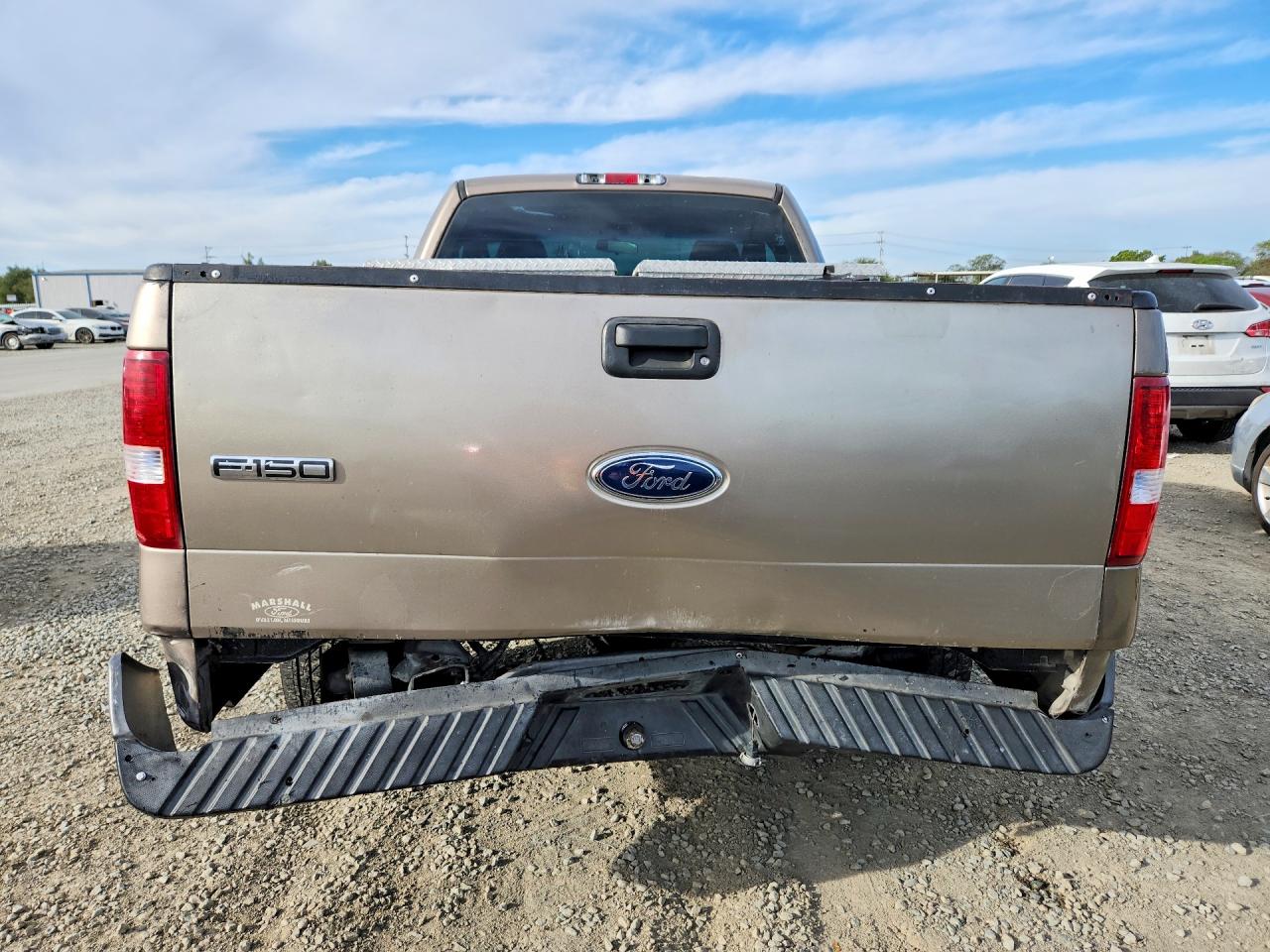 2005 Ford F150 Gold vin: 1FTRF122X5KD69552