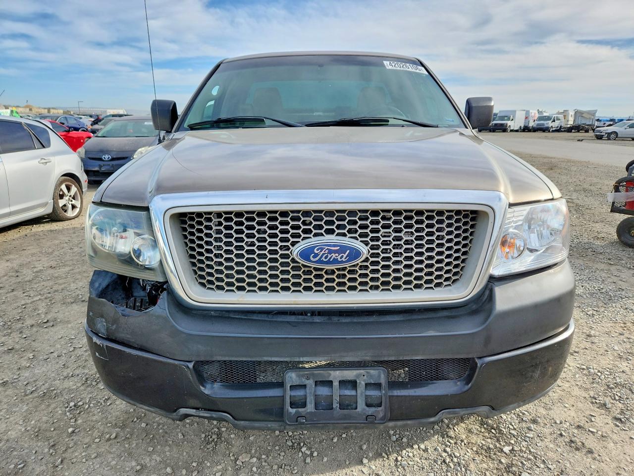 2005 Ford F150 Gold vin: 1FTRF122X5KD69552