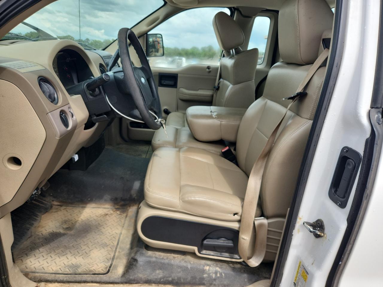 2008 Ford F150 White vin: 1FTRF122X8KB80565 Damage: Left Front Seat Cushion, Torn, 1 To 2 Inches