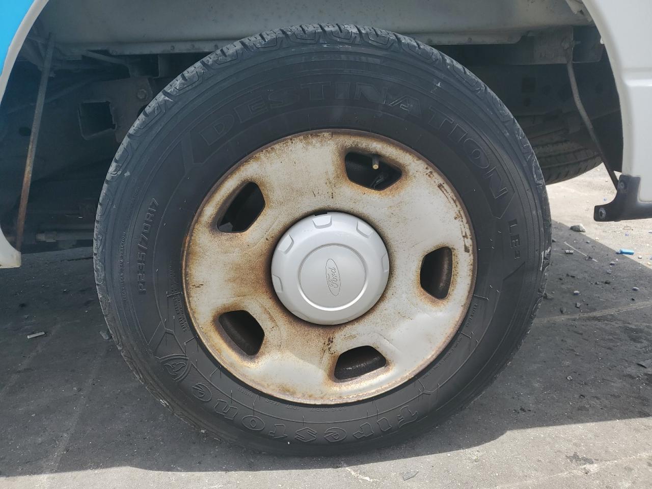 2008 Ford F150 White vin: 1FTRF122X8KB87628 Damage: Left Rear Wheel, Corrosion, > 12 Inches