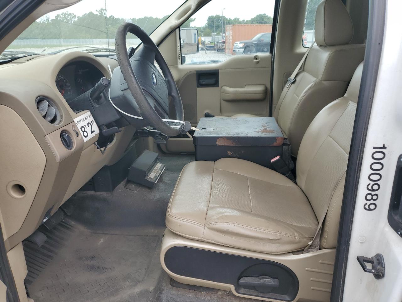 2008 Ford F150 White vin: 1FTRF122X8KB87628 Damage: Steering Wheel, Worn, Replacement Required