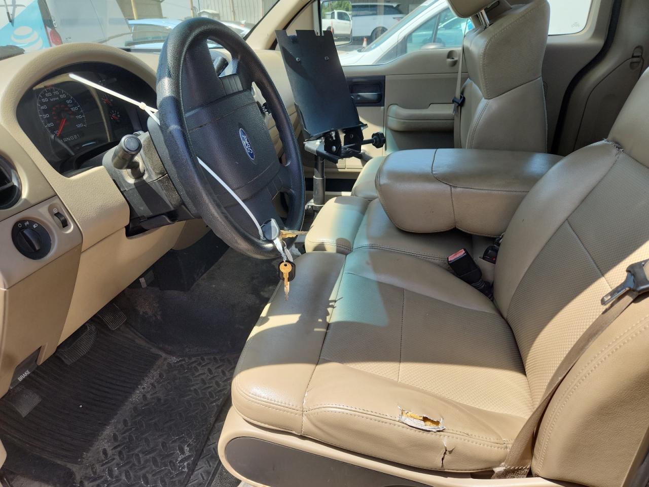 2007 Ford F150 White vin: 1FTRF12W17KD54167 Damage: Left Front Seat Cushion, Torn, 2 To 3 Inches