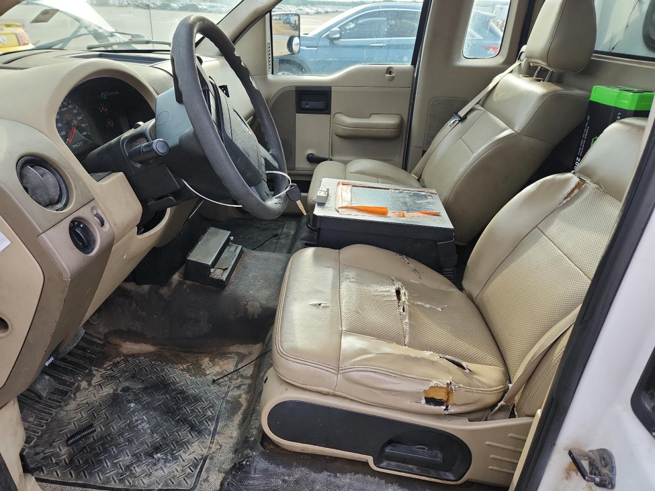 2008 Ford F150 White vin: 1FTRF12W38KB87893 Damage: Steering Wheel, Torn, 7 To 8 Inches