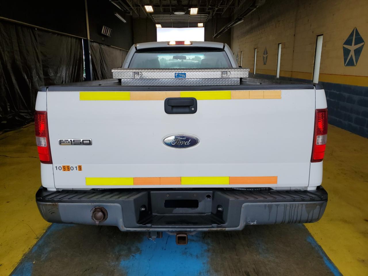 2007 Ford F150 White vin: 1FTRF12W57KD54057 Damage: Rear Metal Bumper Painted, Rust, > 12 Inches