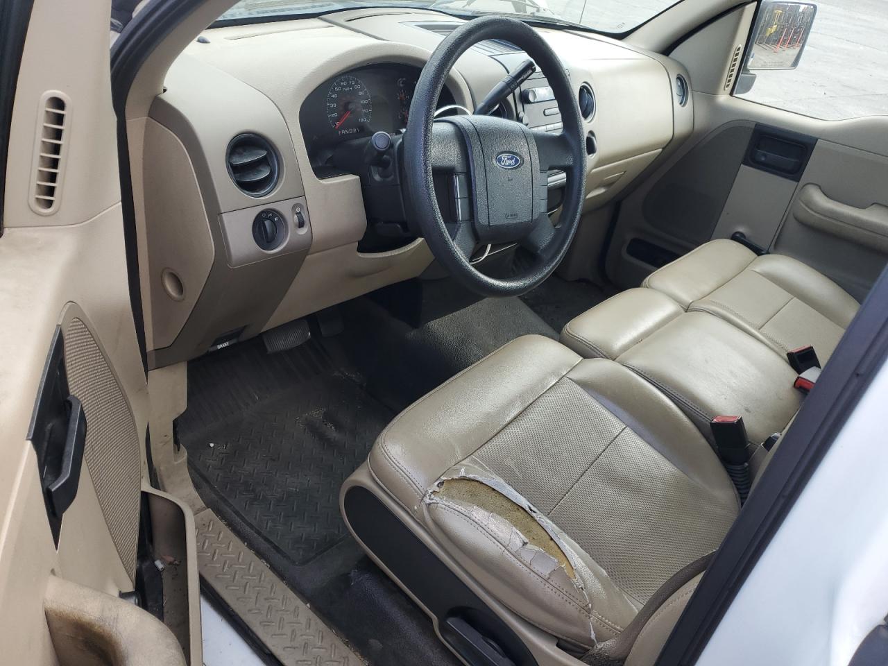 2007 Ford F150 White vin: 1FTRF12W67KD42368 Damage: Steering Wheel, Torn, > 12 Inches