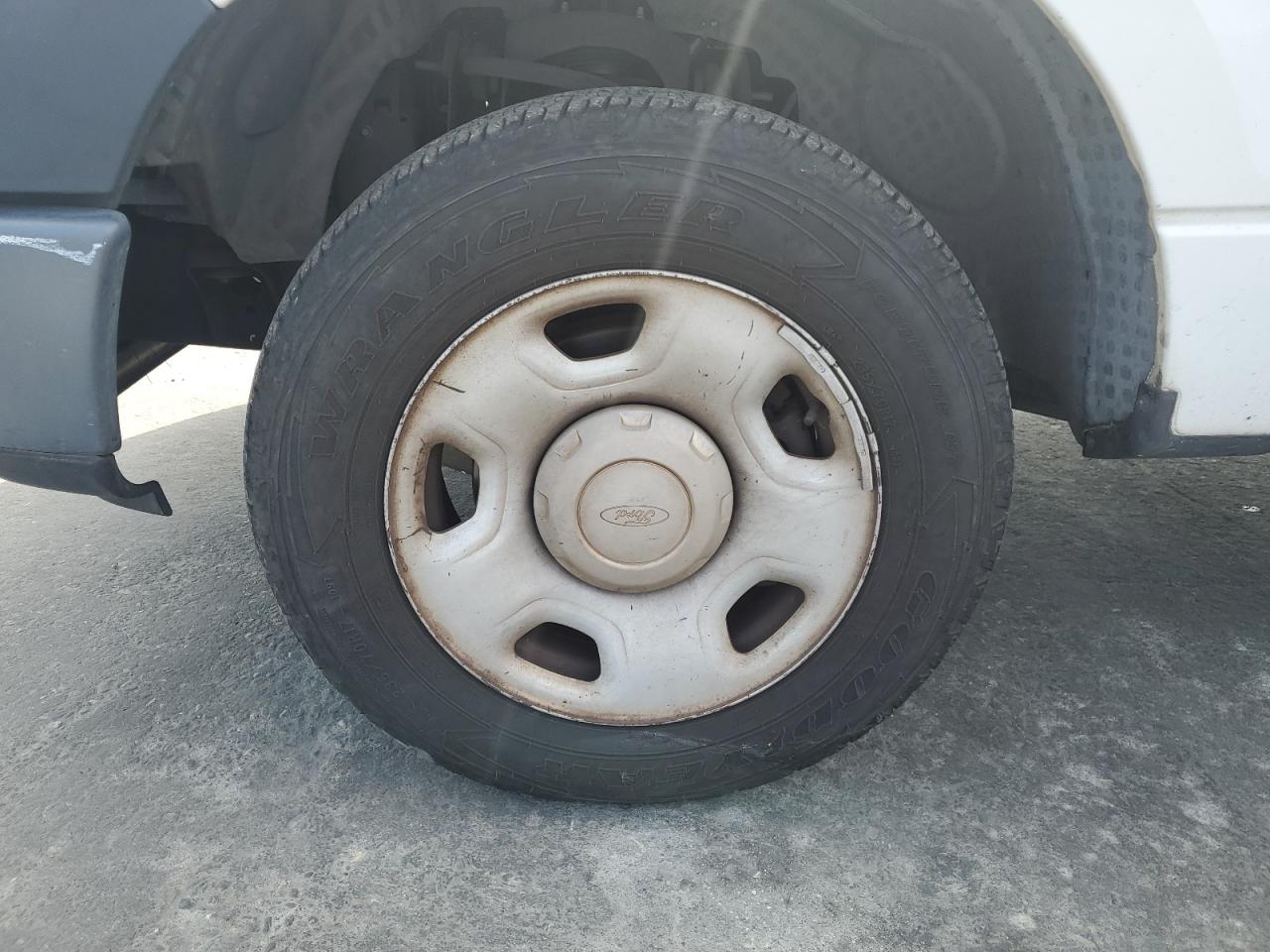 2007 Ford F150 White vin: 1FTRF12W67KD42368 Damage: Left Front Wheel, Curb Rash, > 12 Inches