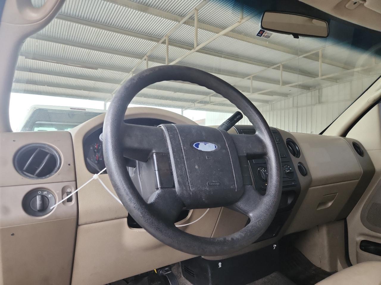 2007 Ford F150 White vin: 1FTRF12W87KD54179 Damage: Steering Wheel, Worn, Acceptable