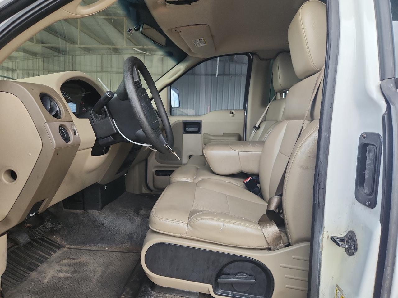 2007 Ford F150 White vin: 1FTRF12W87KD54179 Damage: Left Front Seat Cushion, Torn, 7 To 8 Inches