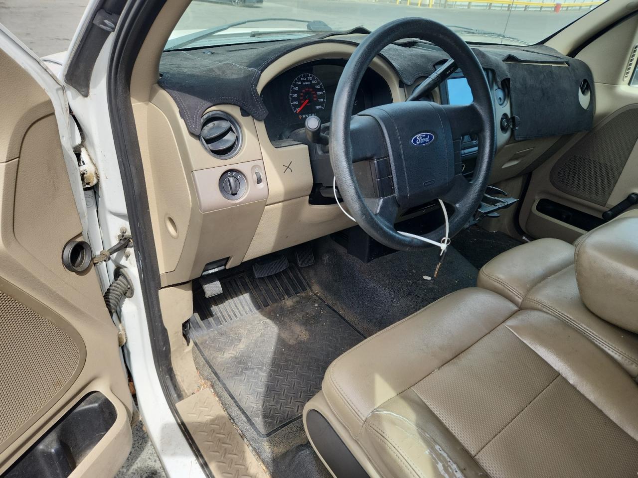 2007 Ford F150 White vin: 1FTRF12W87NA84157 Damage: Left Front Seat Cushion, Worn, Replacement Required