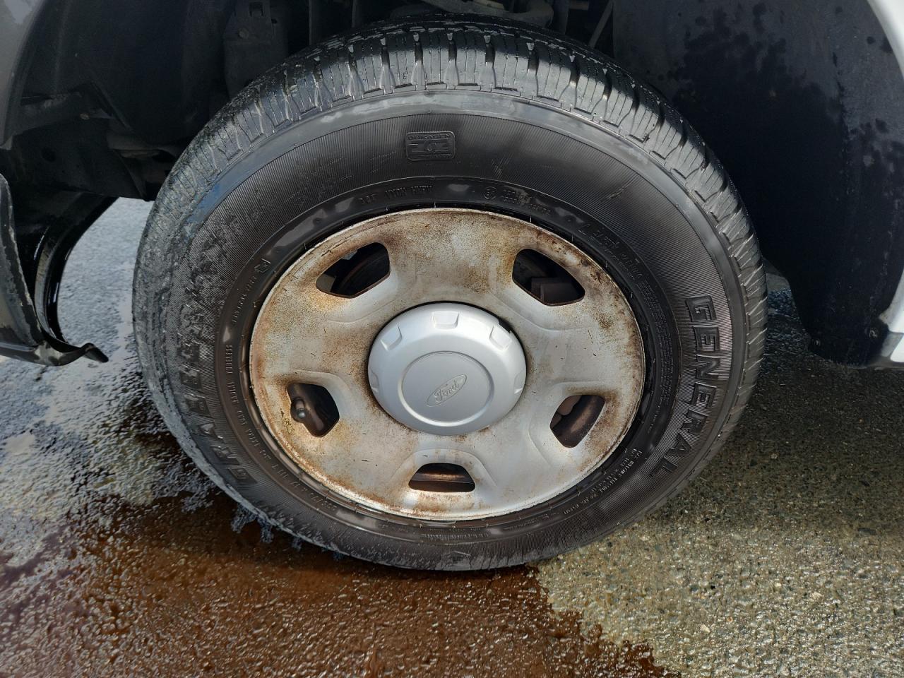 2007 Ford F150 White vin: 1FTRF12W87NA84157 Damage: Left Front Wheel, Corrosion, > 12 Inches