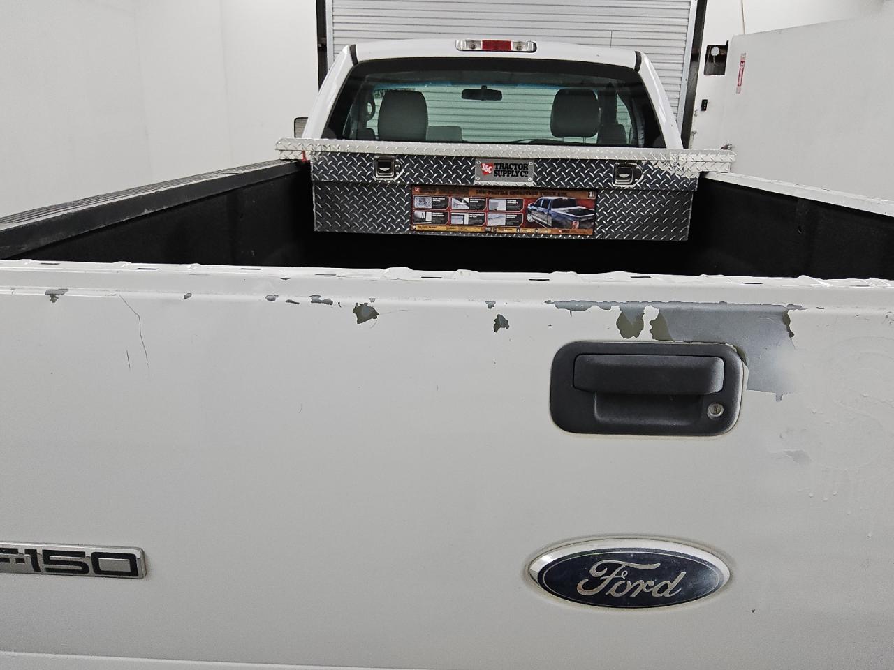 2008 Ford F150 White vin: 1FTRF12W88KE22756 Damage: Tailgate, Peeling, > 12 Inches