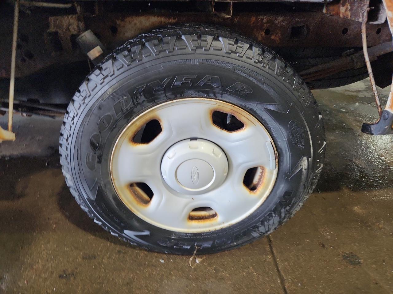 2009 Ford F150 White vin: 1FTRF12W89KA23802 Damage: Left Rear Wheel, Rust, Repair Required