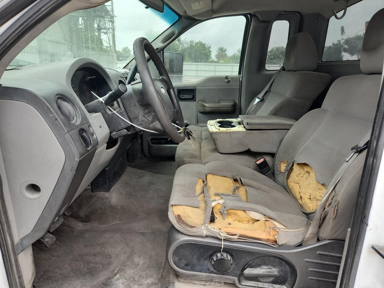 2004 Ford F150 White vin: 1FTRF12W94NC12367 Damage: Left Front Seat, Torn, > 12 Inches