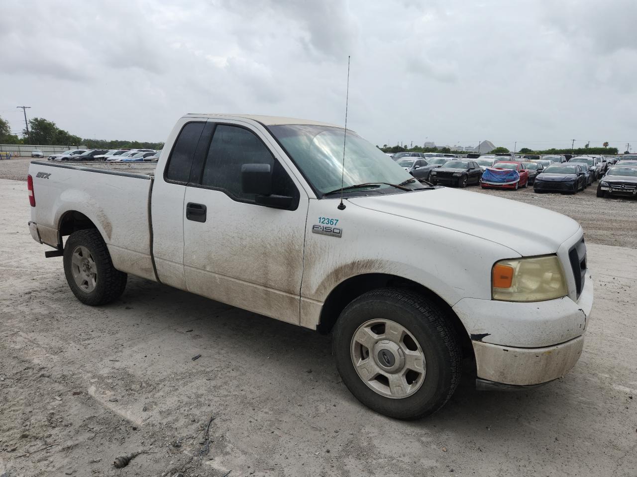 2004 Ford F150 White vin: 1FTRF12W94NC12367 Damage: Right Front Fender, Dent(S) W/ Paint Dmg, 2 To 3 Inches