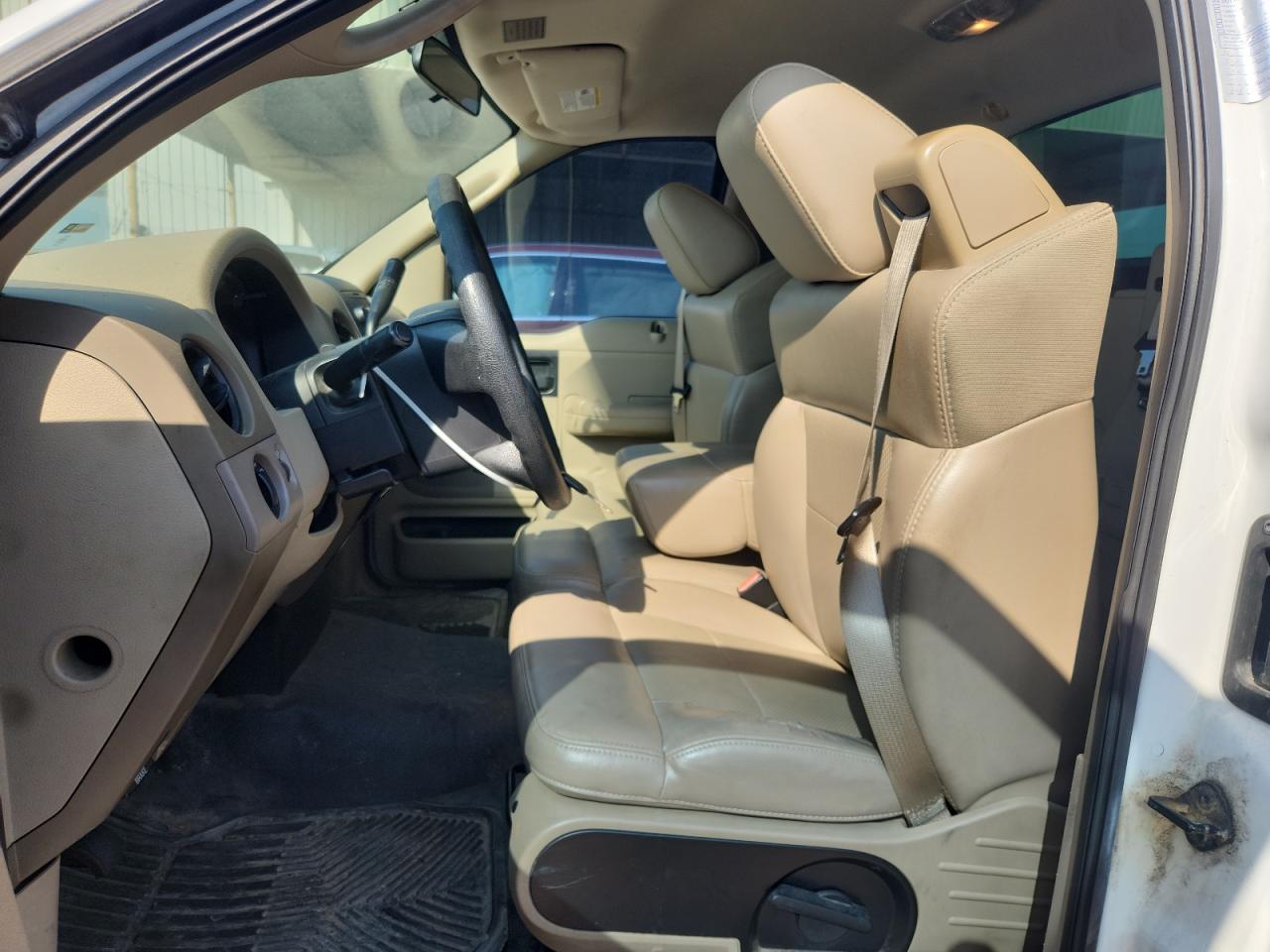 2007 Ford F150 White vin: 1FTRF12WX7KC18135 Damage: Left Front Seat Cushion, Worn, Replacement Required