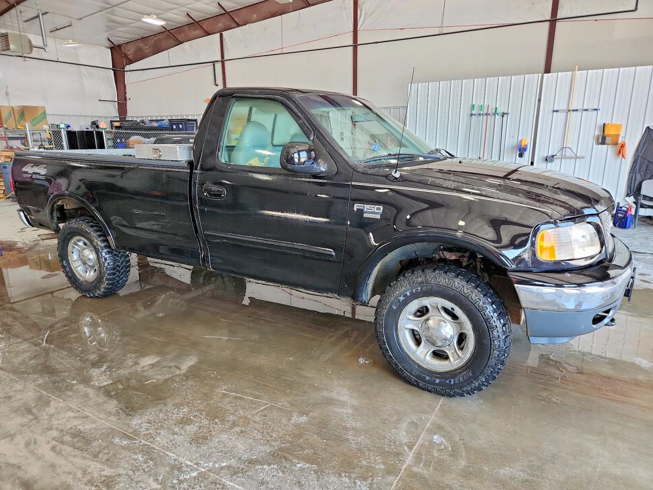 1999 Ford F150 Black vin: 1FTRF18W9XNA63941