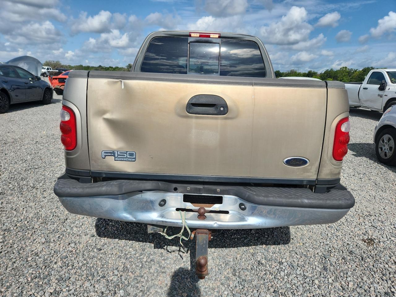 2002 Ford F150 Supercrew Tan vin: 1FTRW07612KB60220