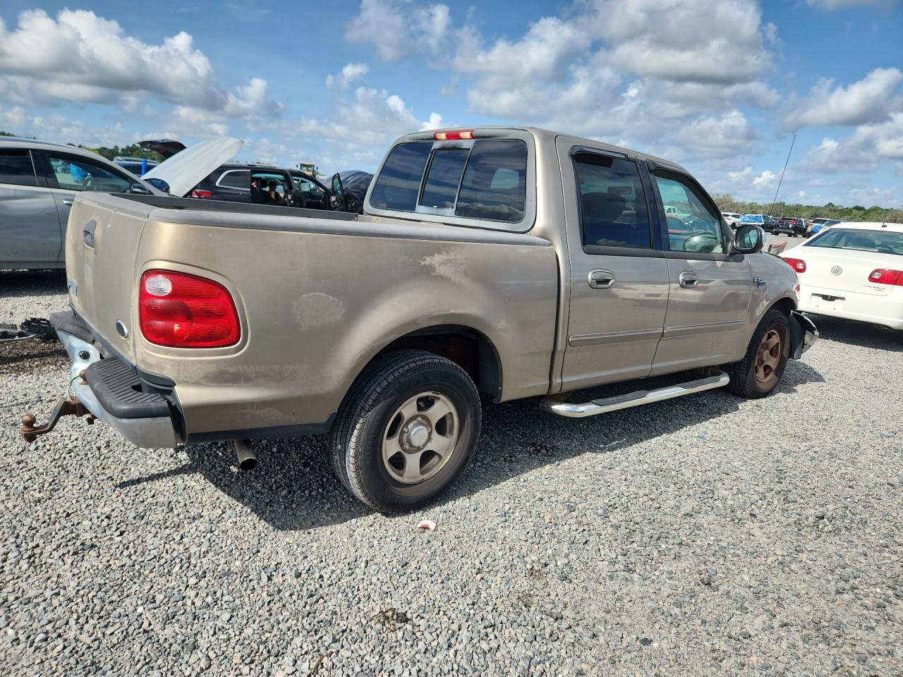 2002 Ford F150 Supercrew Tan vin: 1FTRW07612KB60220