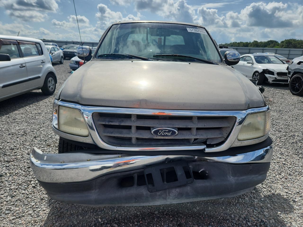 2002 Ford F150 Supercrew Tan vin: 1FTRW07612KB60220