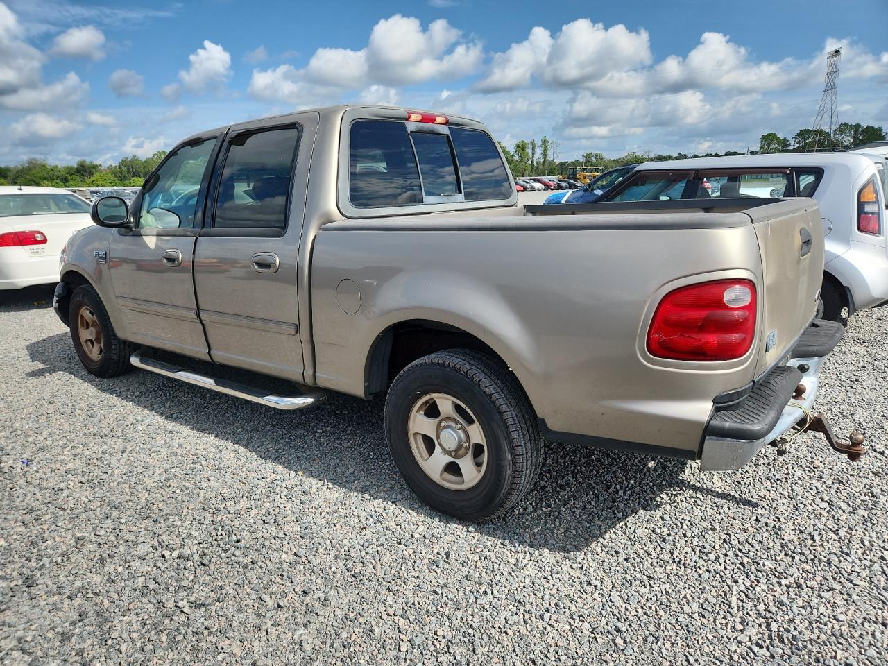 2002 Ford F150 Supercrew Tan vin: 1FTRW07612KB60220
