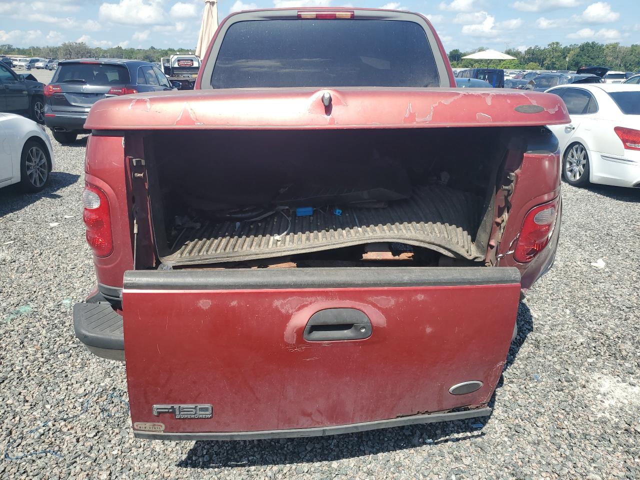 2003 Ford F150 Supercrew Red vin: 1FTRW07643KD57397