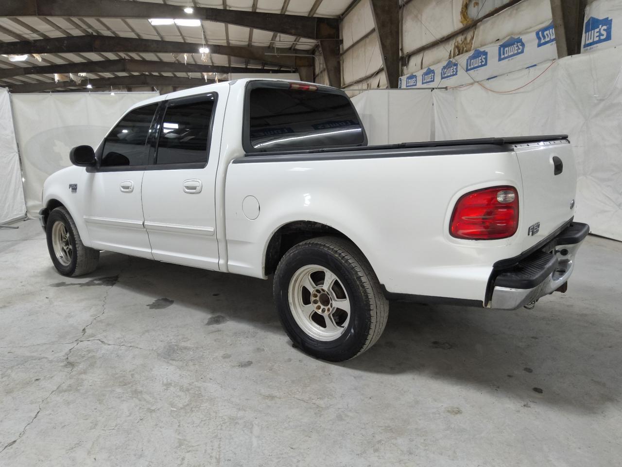 2003 Ford F150 Supercrew White vin: 1FTRW07653KA13657 Damage: Left Bed Side, Chipped, 2