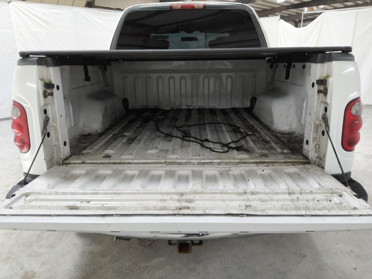 2003 Ford F150 Supercrew White vin: 1FTRW07653KA13657 Damage: Inside Bed, Multiple Scratches Heavy, 10 Or More
