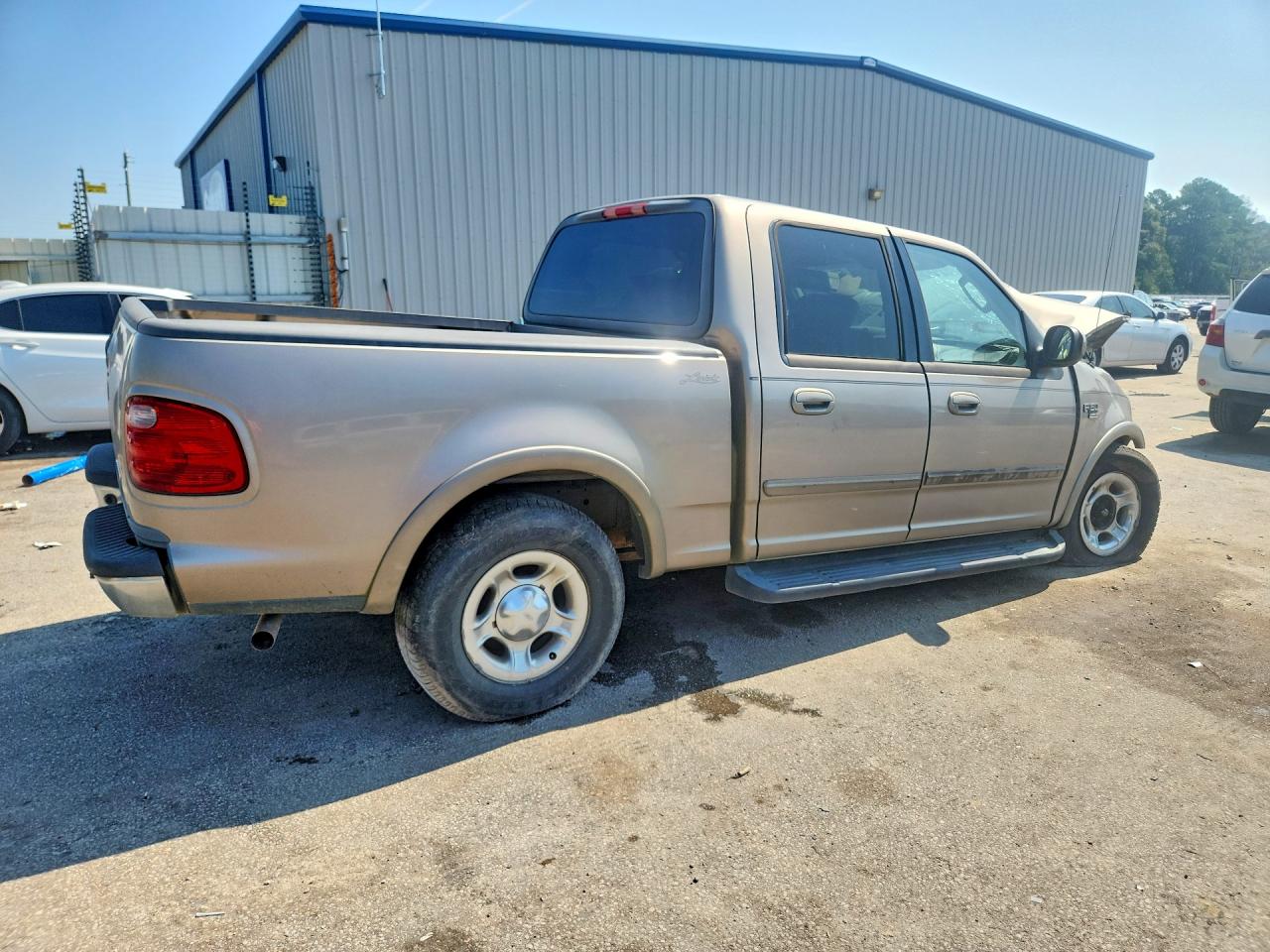 2003 Ford F150 Supercrew Tan vin: 1FTRW07L03KD28470