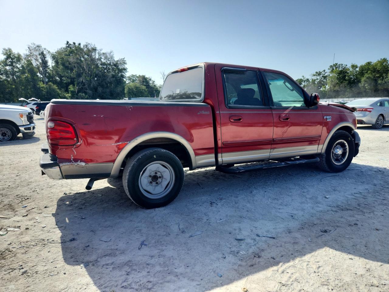 2002 Ford F150 Red vin: 1FTRW07L52KE19703