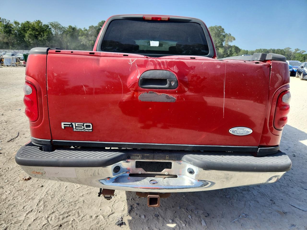 2002 Ford F150 Red vin: 1FTRW07L52KE19703