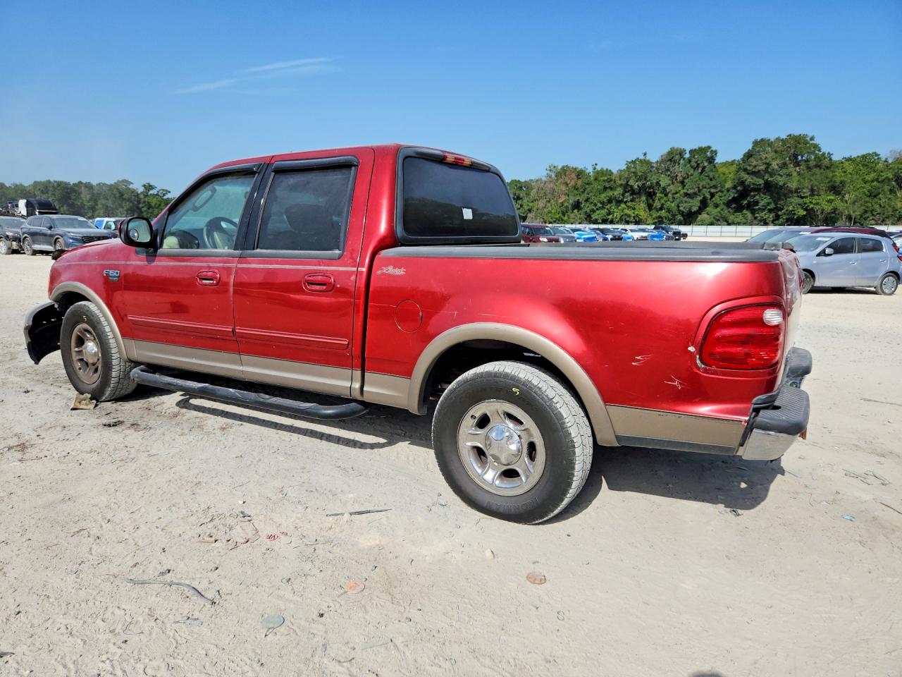 2002 Ford F150 Red vin: 1FTRW07L52KE19703