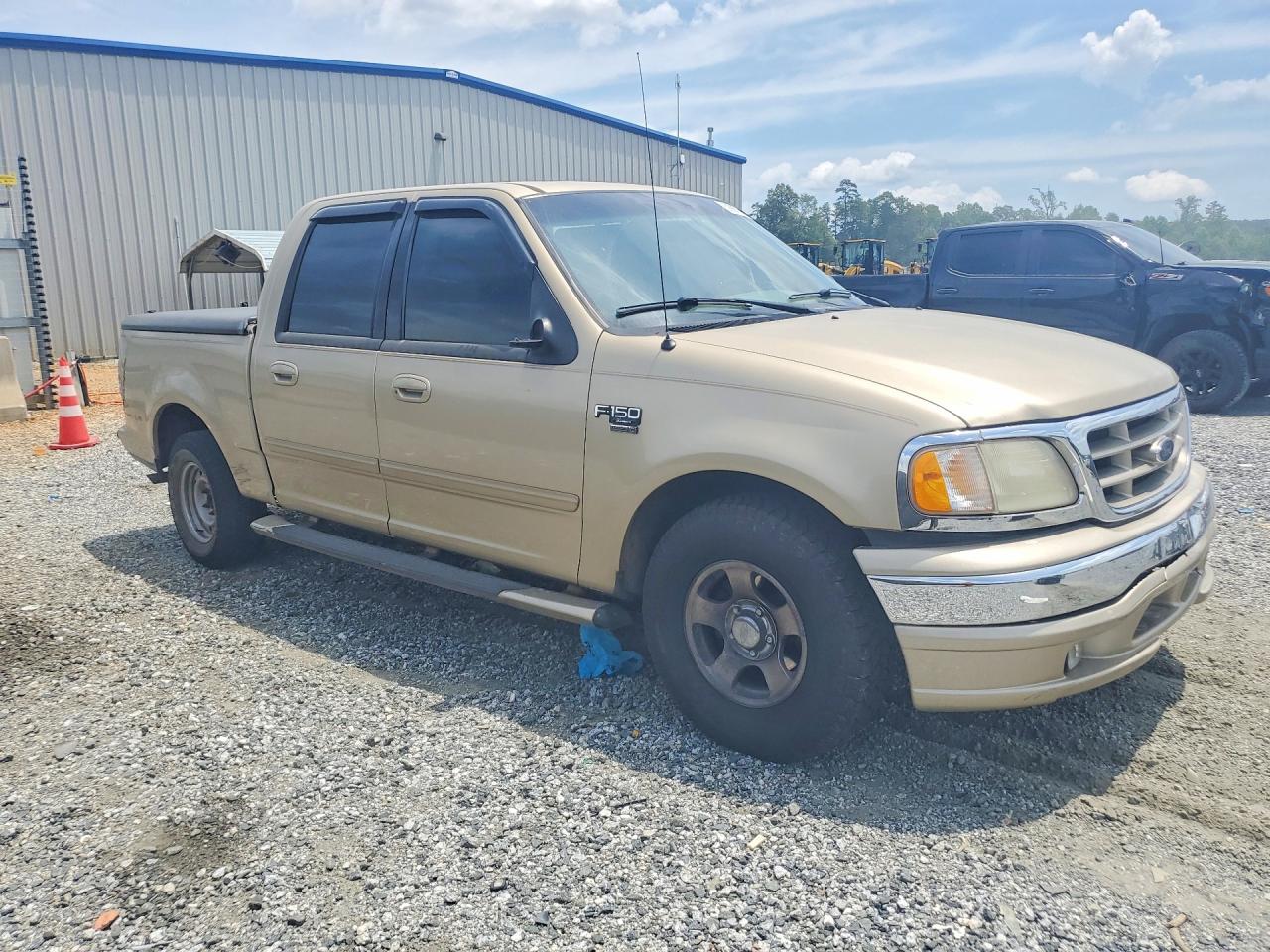 2001 Ford F150 Supercrew Tan vin: 1FTRW07L91KE33585