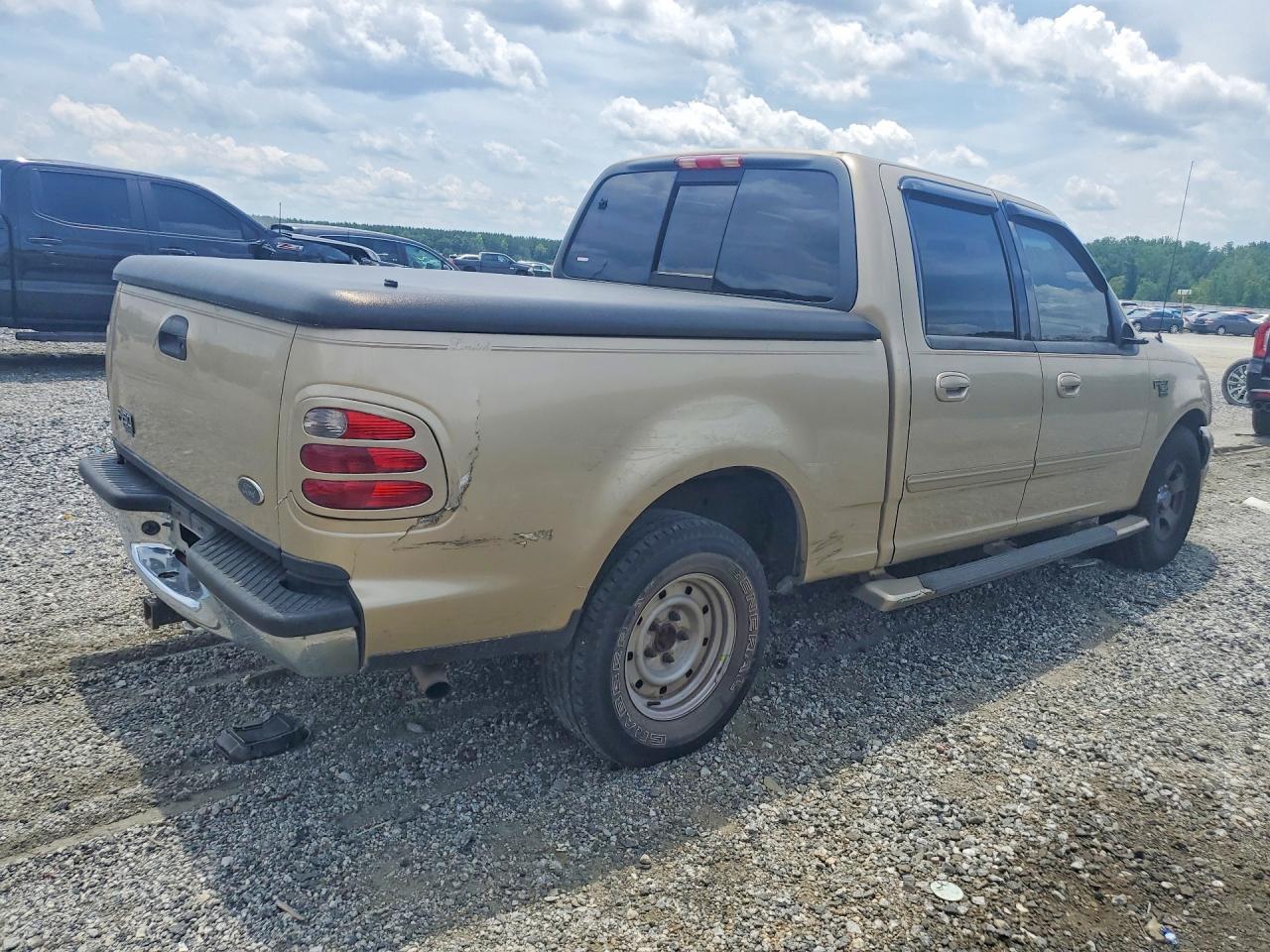 2001 Ford F150 Supercrew Tan vin: 1FTRW07L91KE33585