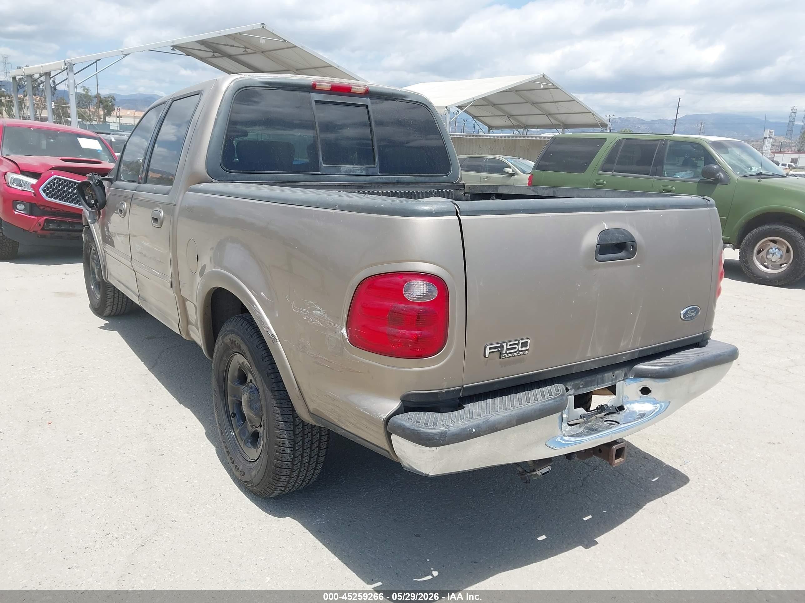 2001 Ford F-150 Harley-davidson Edition/king Ranch Edition/lariat/xlt Champagne vin: 1FTRW07LX1KA11602