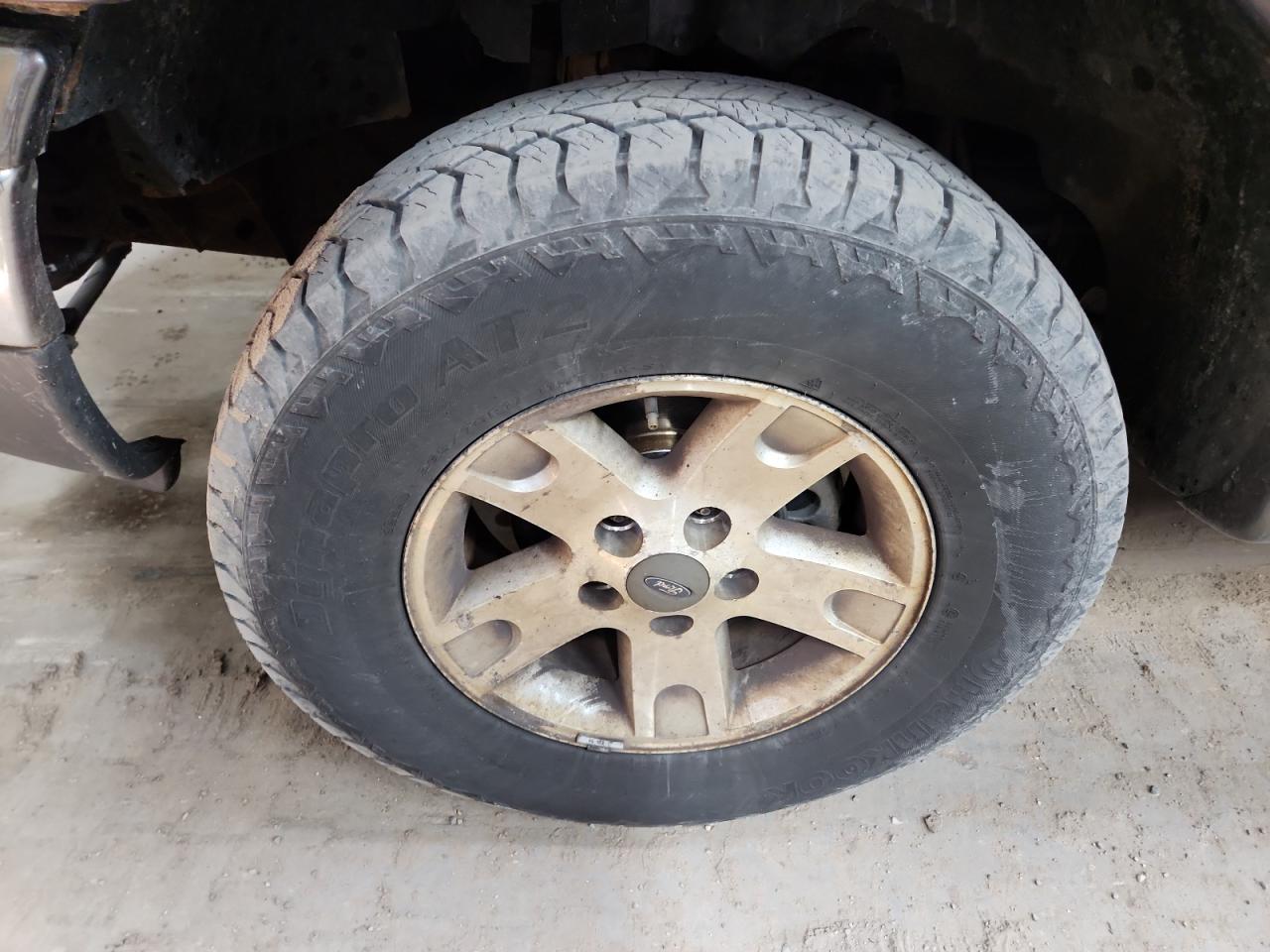 2003 Ford F150 Supercrew Black vin: 1FTRW08L33KC56226 Damage: Left Front Wheel, Corrosion, 7 To 8 Inches