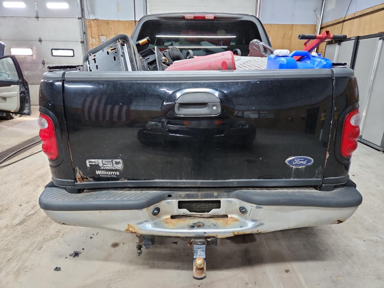 2003 Ford F150 Supercrew Black vin: 1FTRW08L33KC56226 Damage: Tailgate, Rust, Severe Damage
