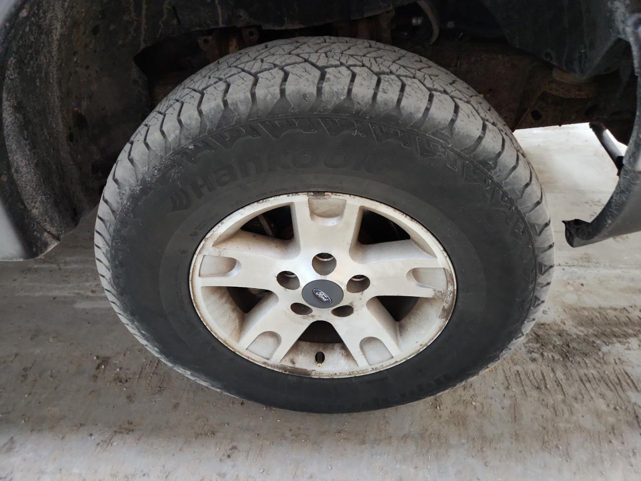 2003 Ford F150 Supercrew Black vin: 1FTRW08L33KC56226 Damage: Right Front Wheel, Corrosion, > 12 Inches