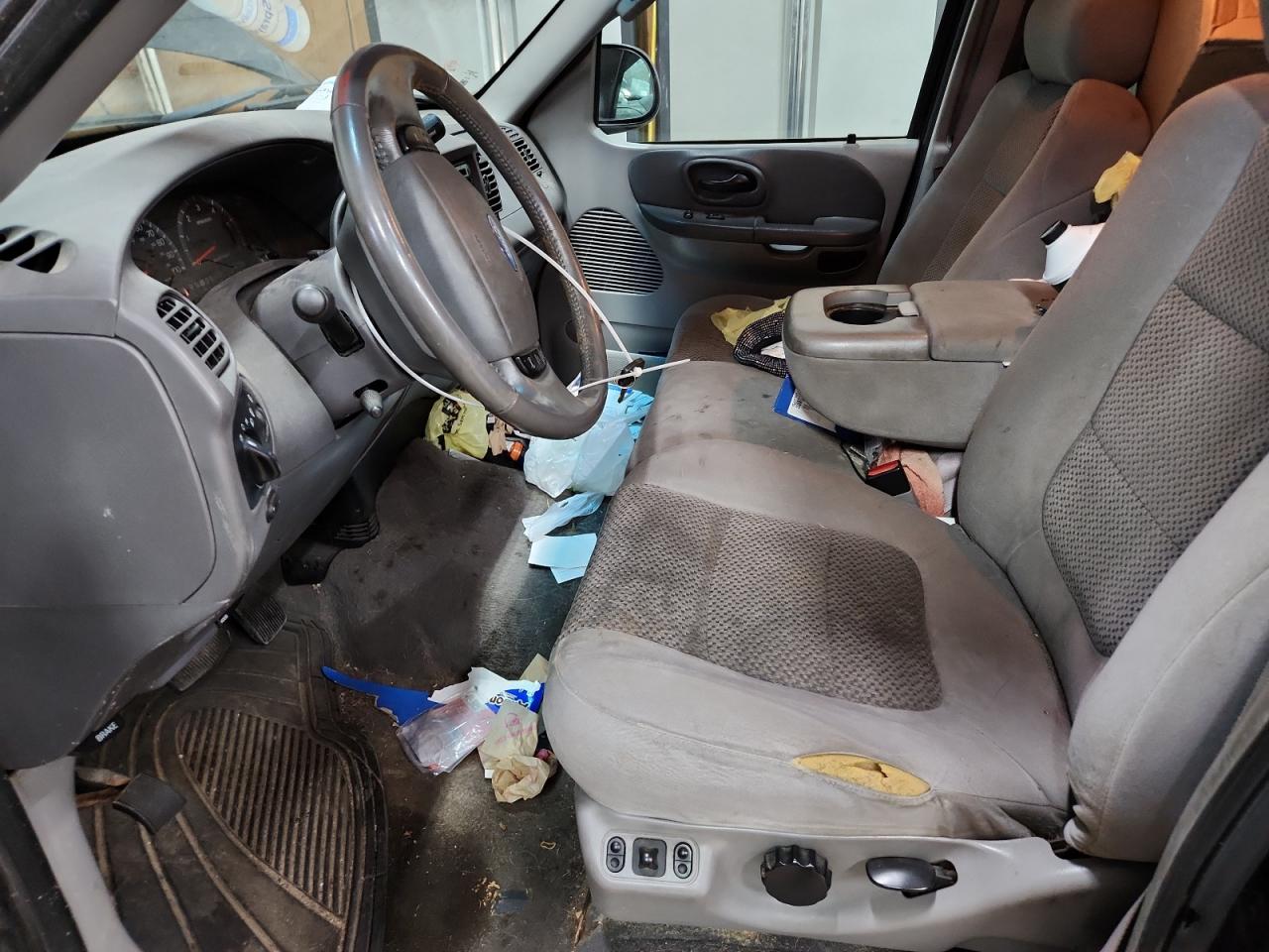 2003 Ford F150 Supercrew Black vin: 1FTRW08L33KC56226 Damage: Left Front Seat Cushion, Torn, 3 To 4 Inches