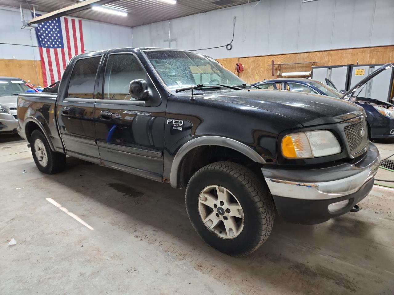 2003 Ford F150 Supercrew Black vin: 1FTRW08L33KC56226 Damage: Right Front Door, Rust, 3 To 4 Inches