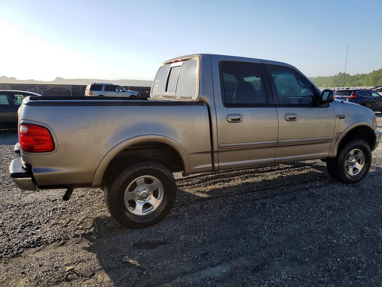 2001 Ford F150 Supercrew Tan vin: 1FTRW08L71KF36664