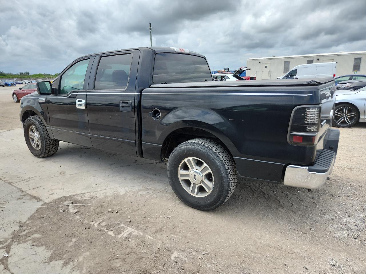 2007 Ford F150 Supercrew Black vin: 1FTRW12W07KC46266 Damage: Left Front Door, Faded, Repair Required