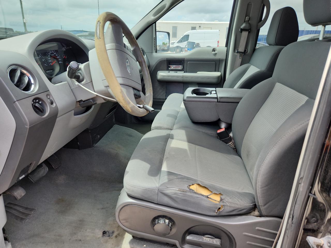 2007 Ford F150 Supercrew Black vin: 1FTRW12W07KC46266 Damage: Steering Wheel, Worn, Replacement Required