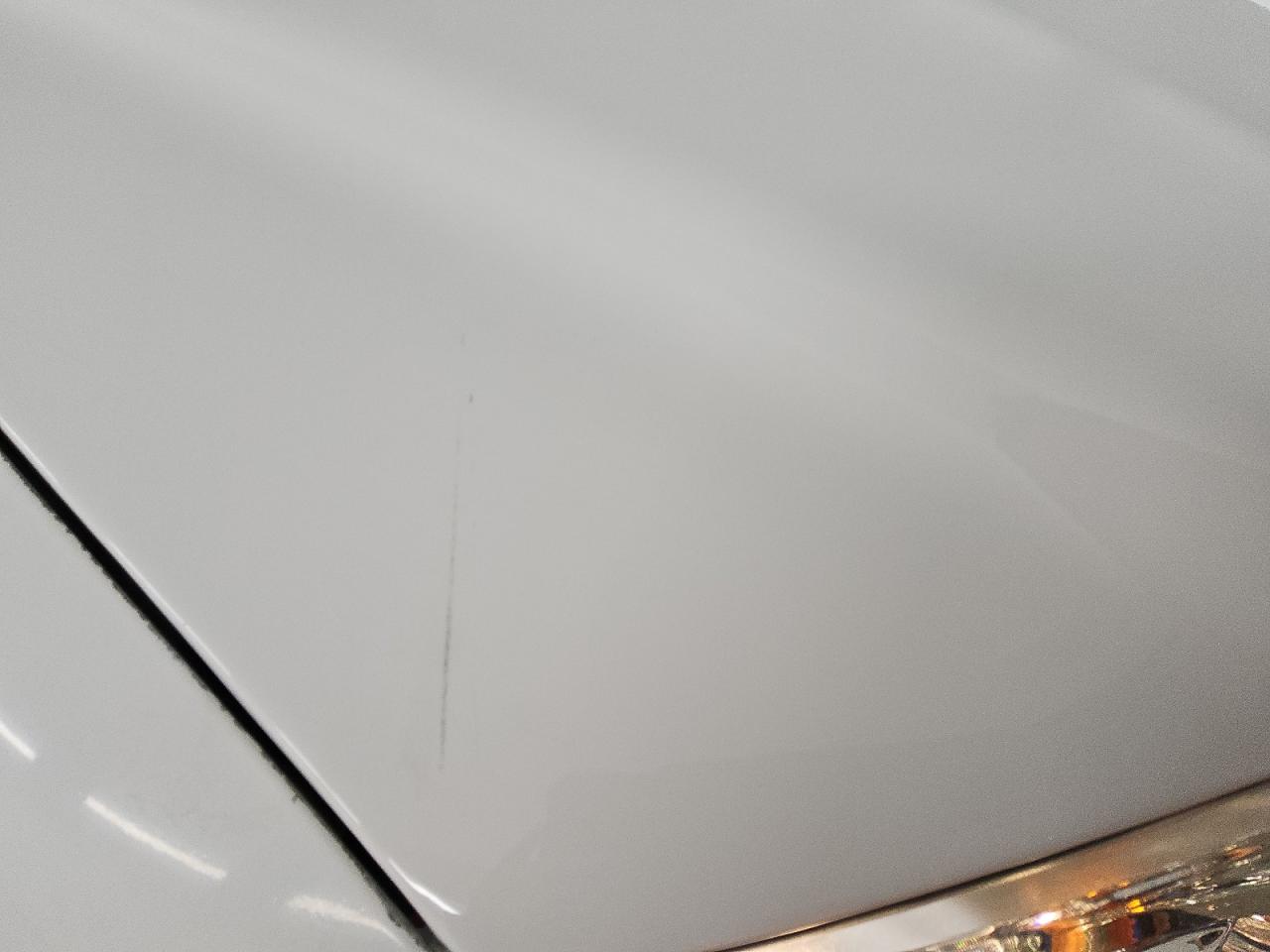 2005 Ford F150 Supercrew White vin: 1FTRW12W95FB33714 Damage: Hood, Heavy Scratch, 4 To 5 Inches